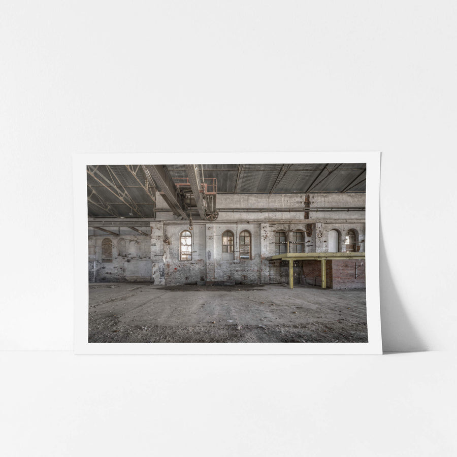 Power House Platform at Portland Cement Works, an overhead crane rail runs the length of the hall, its rusted hoist.