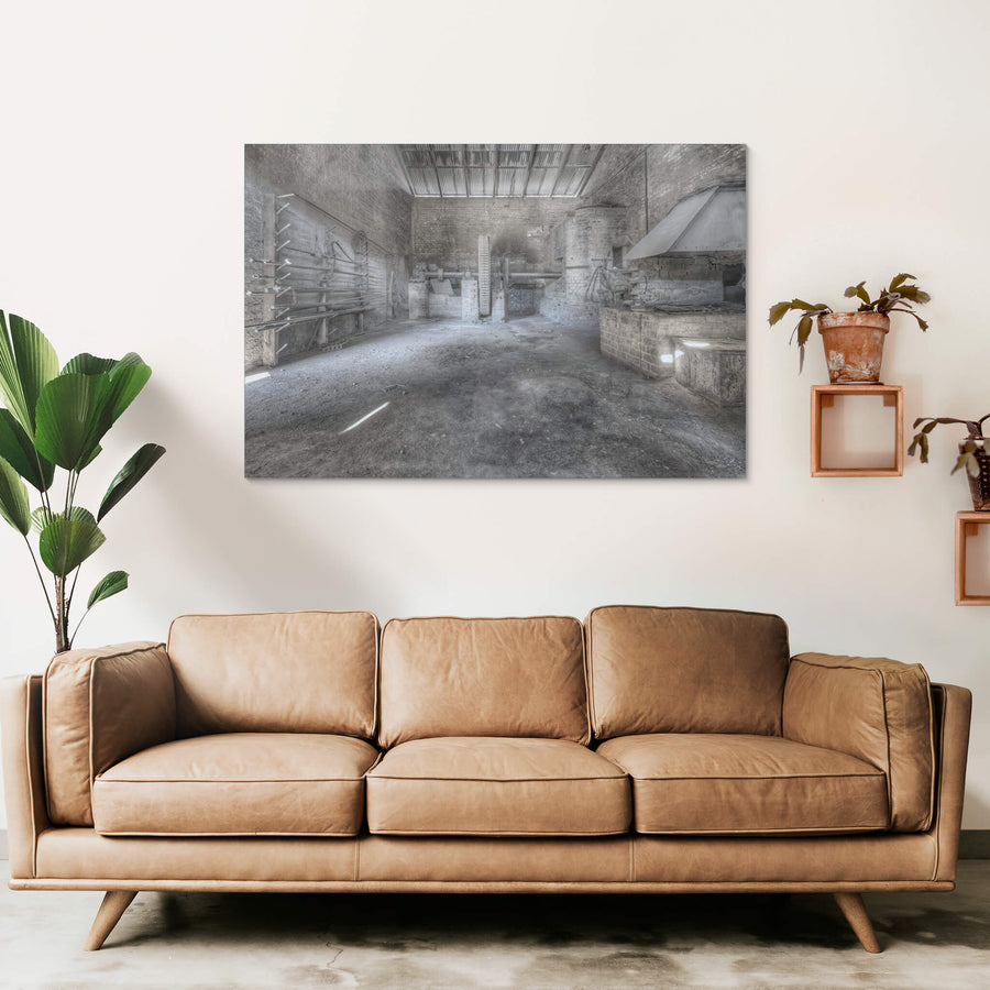 Raffan Mill at Portland Cement Works, bare brick walls rise to a corrugated iron roof inside one of the mill buildings.