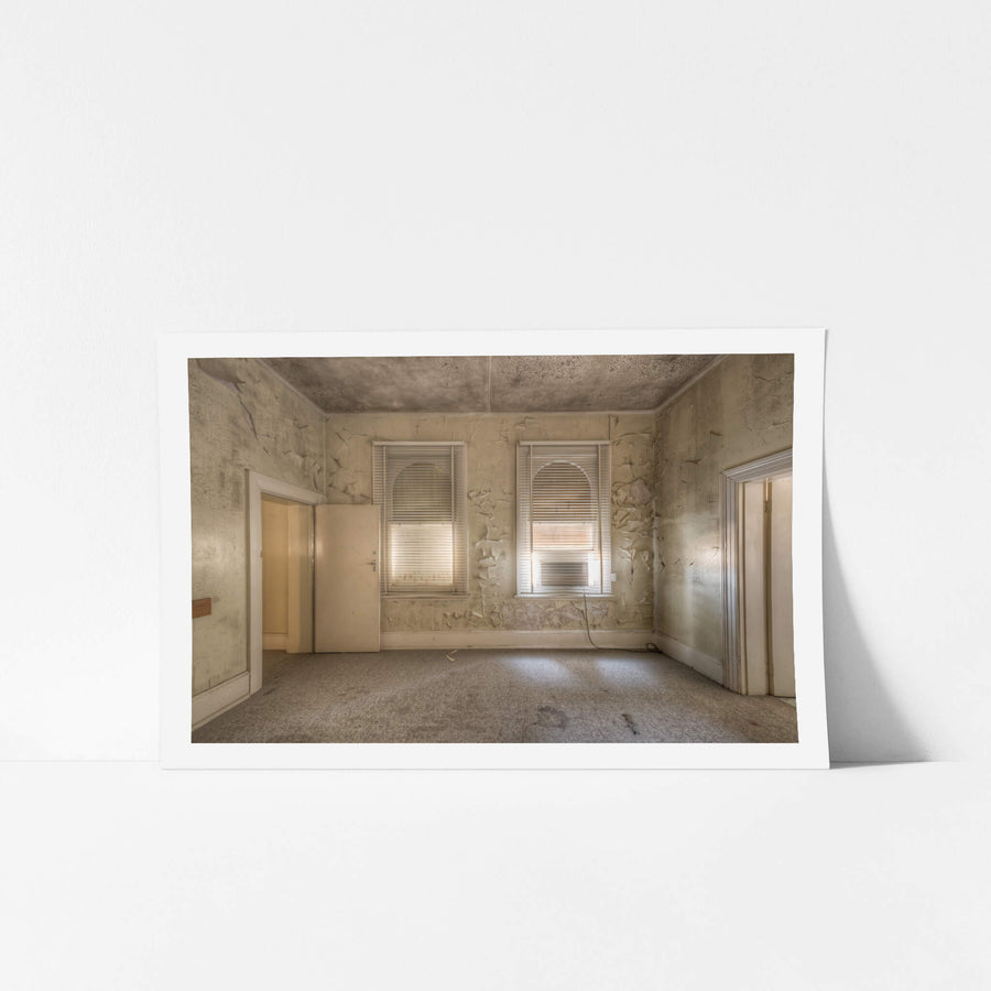 Supervisors Office at Portland Cement Works, two arched windows filter pale light through venetian blinds.