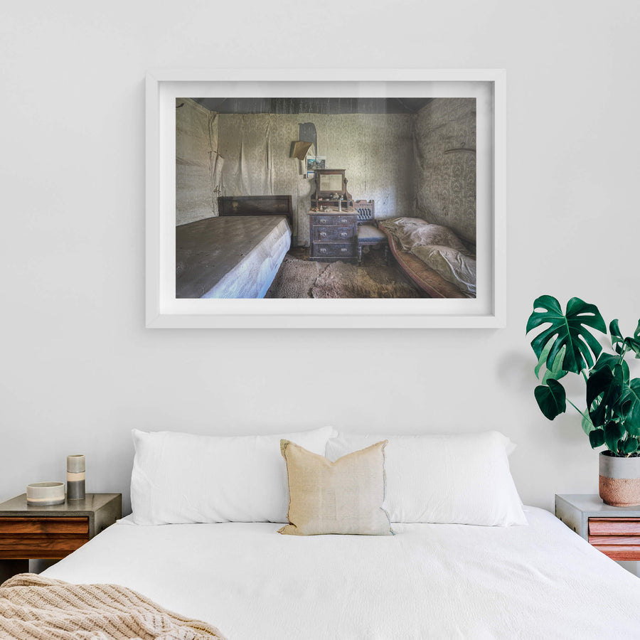 Side Bedroom at Woolla, two single beds fill the room, pushed against opposite walls with a timber dresser wedged.