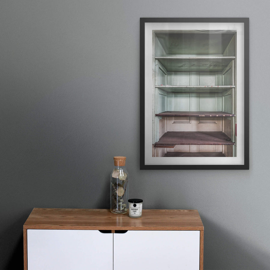 Bar Shelving at Terminus Hotel, a built-in timber cabinet sits behind the bar, its doors open.