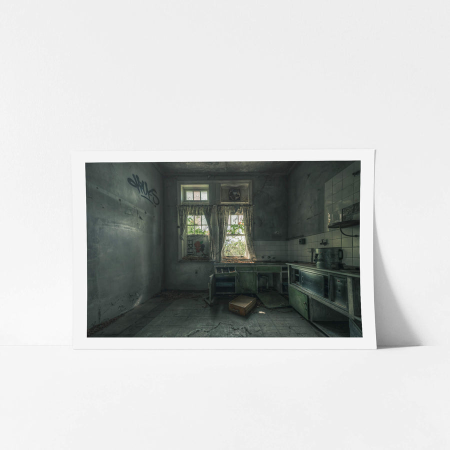 The Back Kitchen at The Asylum, green paint peels from steel benchtop cabinets along the right wall.