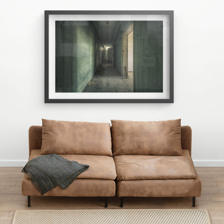 Hall of Shadows at The Asylum, a narrow corridor stretches deep into the building.