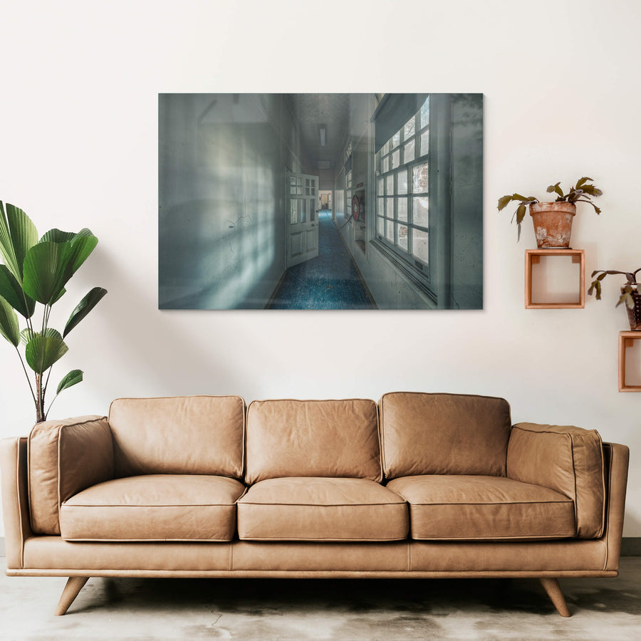 Long Blue Walk at The Asylum, a narrow corridor stretches deep into the building.