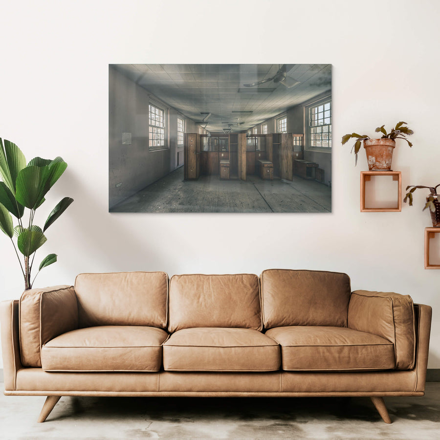Patient Partitions at The Asylum, timber partitions stand clustered in the centre of a long ward.