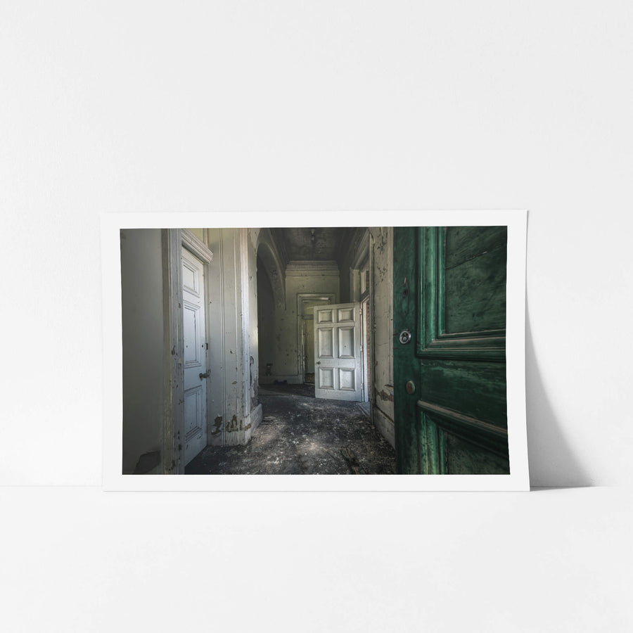 Rough Patch at The Asylum, a deep green door stands open at the entrance to a corridor.