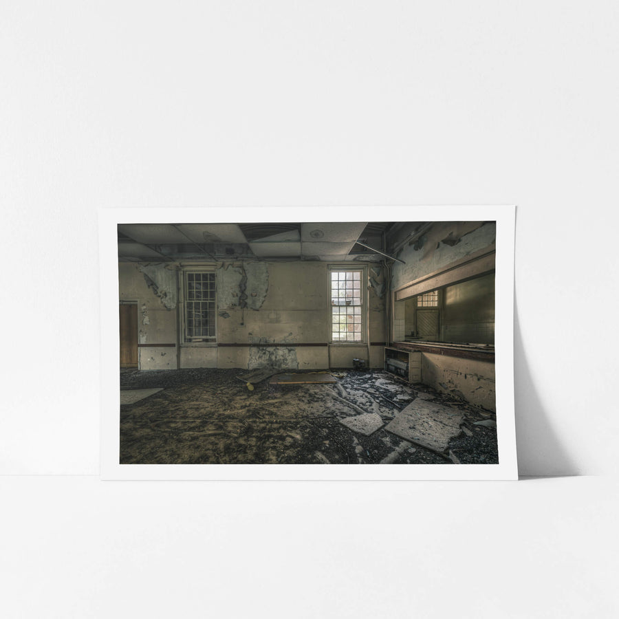 Serving Area at The Asylum, a large interior room with a long servery counter running along the right wall.