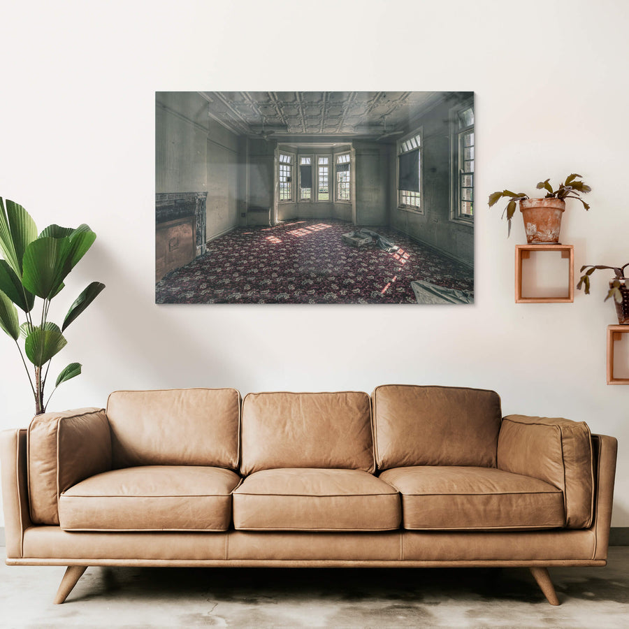 The Grand Room at The Asylum, a deep crimson and grey floral carpet covers the entire floor, still intact.