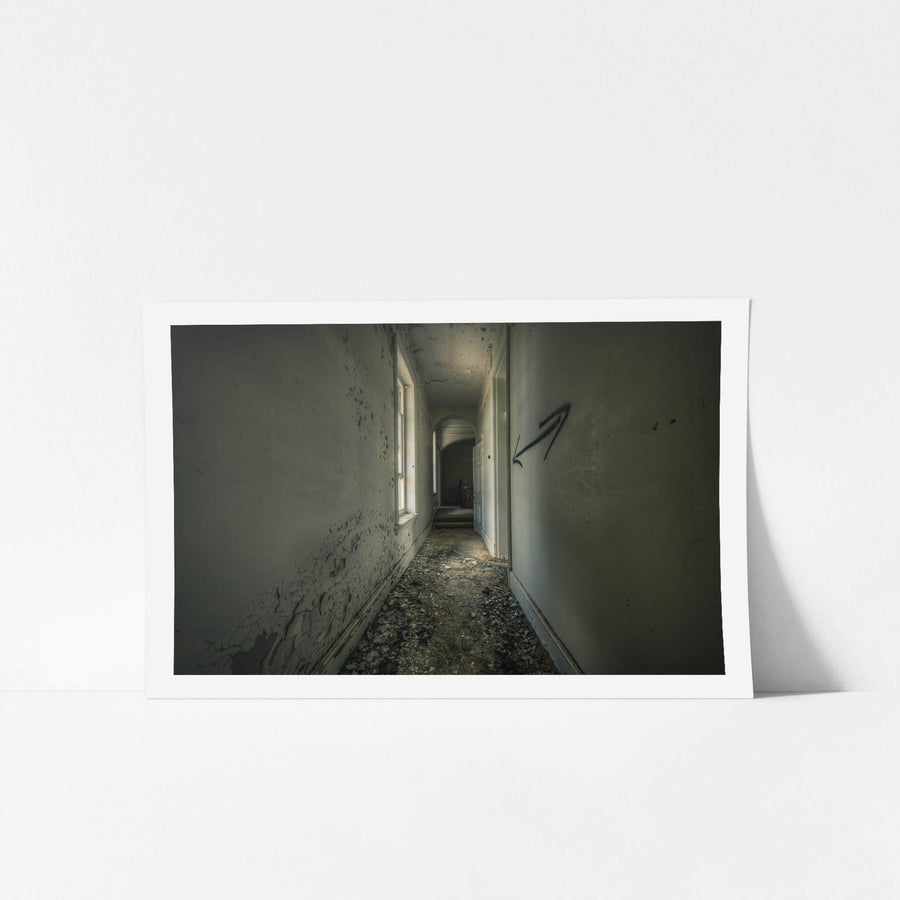 Walking on the Ceiling at The Asylum, a narrow corridor stretches deep into the building.
