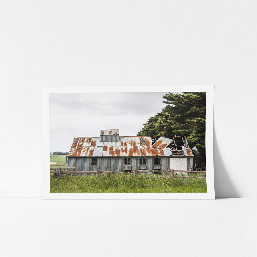Colac Shed at The Woolshed, a corrugated iron woolshed sits low against flat green pasture near Colac, in Victoria's.
