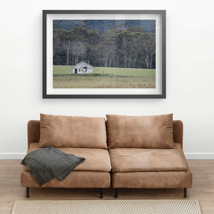 Nimmitabel Shed at The Woolshed, a single weatherboard shed sits on a low rise in the middle of open grazing country near.