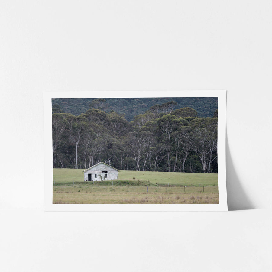 Nimmitabel Shed at The Woolshed, a single weatherboard shed sits on a low rise in the middle of open grazing country near.