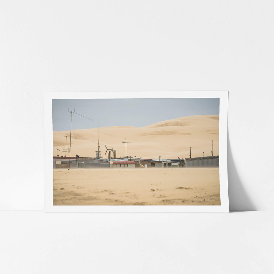Aerials at Tin City, a low line of corrugated iron shacks sits half-buried at the base of the Stockton Dunes.
