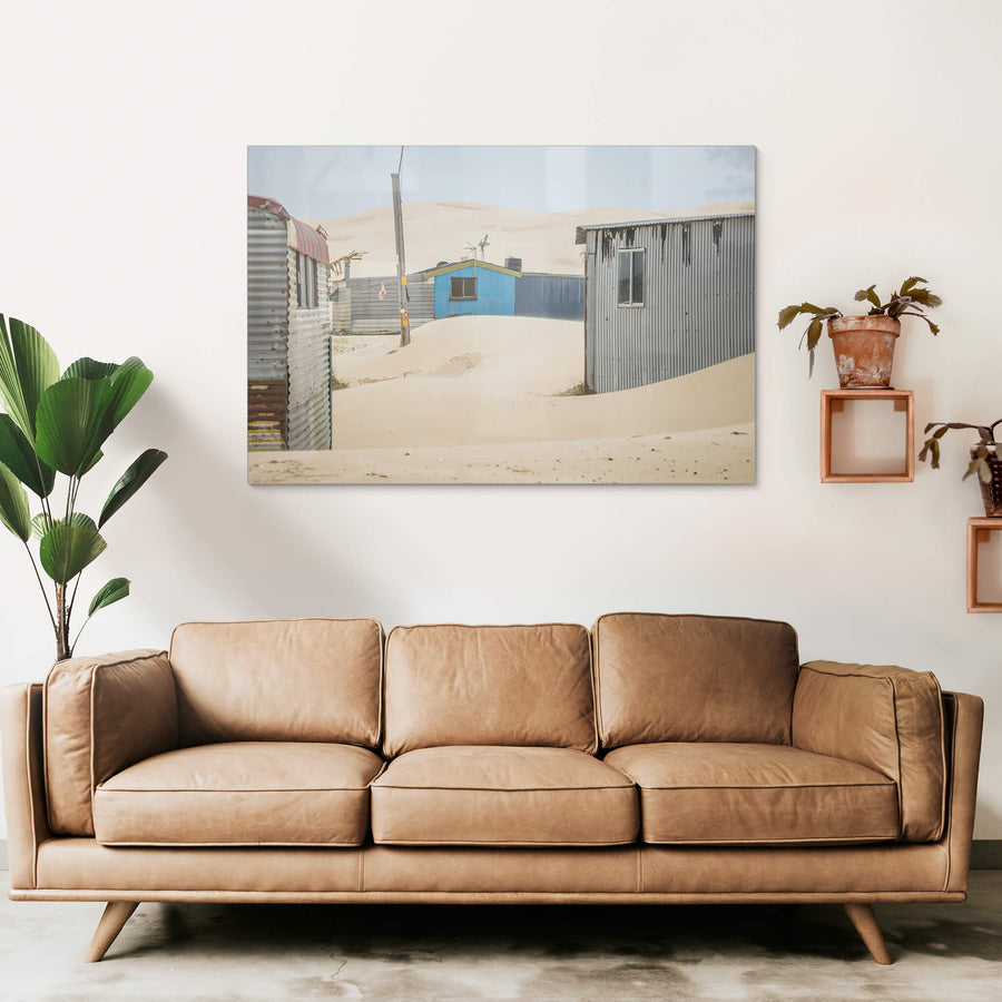City Centre at Tin City, sand drifts between corrugated iron shacks, banking against walls in smooth curves.