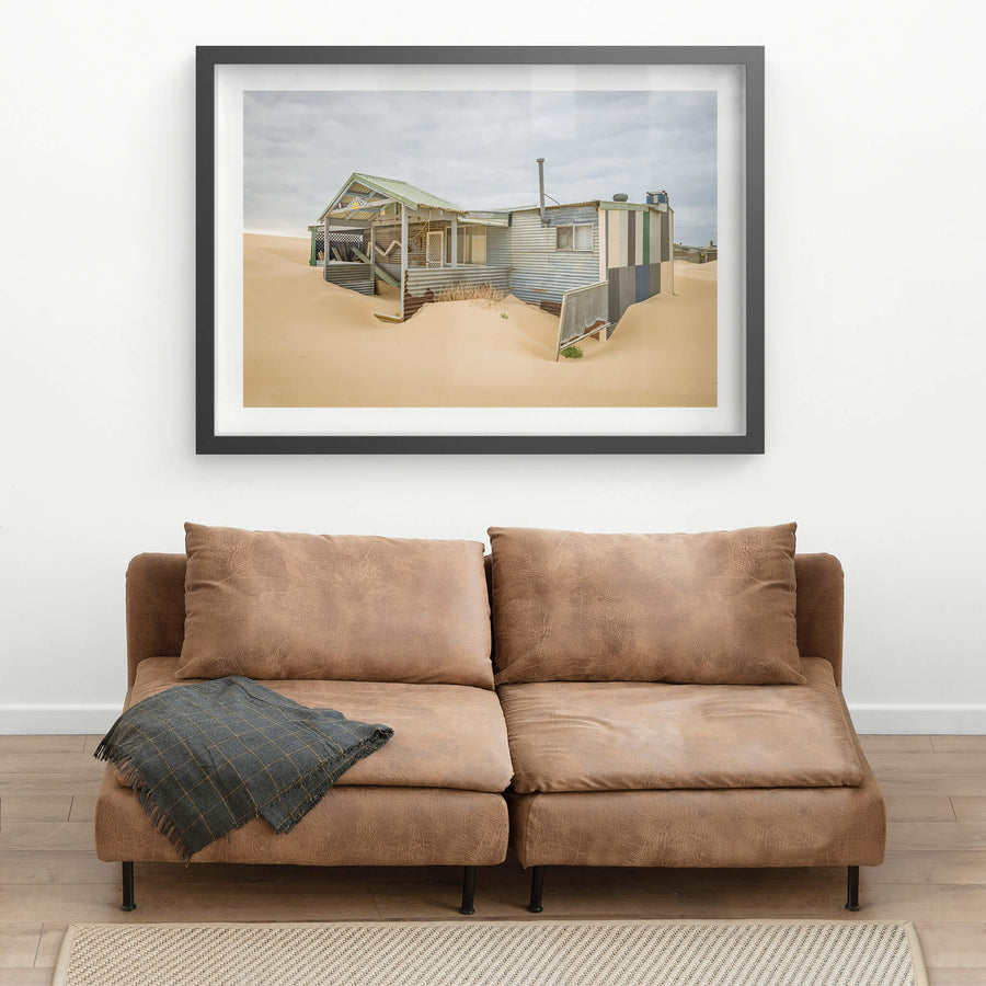 Front Yard at Tin City, the sand swept porch of one of the Tin City shacks.
