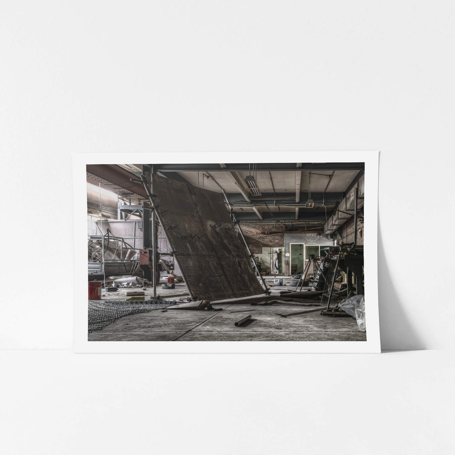 Boilermakers Workshop at Wangi Power Station, a large perforated steel screen leans against its frame in the centre.