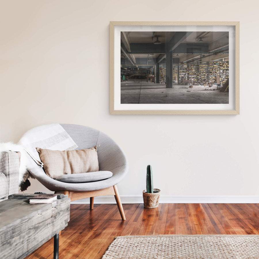 Store Roof 2 at Wangi Power Station, steel columns painted dark teal carry heavy I-beams across a low ceiling.