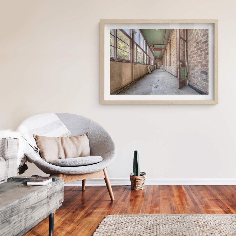 Annex at Waterfall Sanatorium, a long enclosed corridor runs between a brick ward building and a wall of timber-framed.