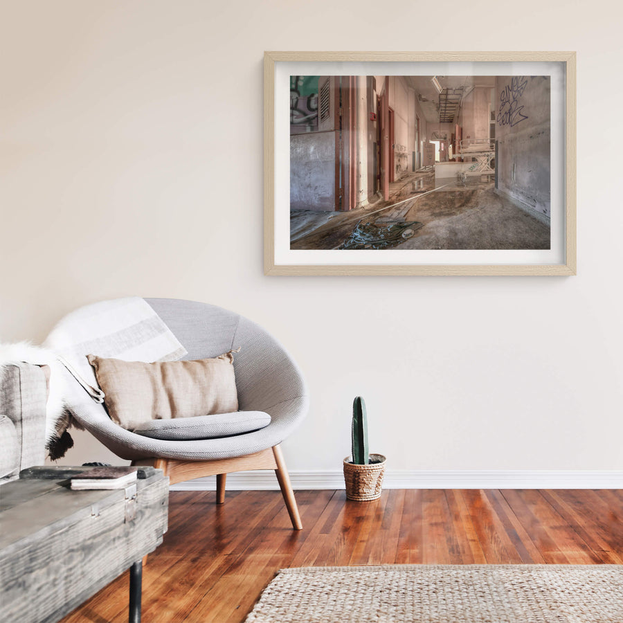 Caleb Was Here at Waterfall Sanatorium, a corridor runs deep into the ward.