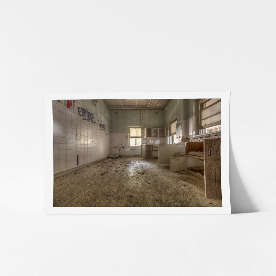 Nothing Left at Waterfall Sanatorium, white ceramic tiles line the left wall, half of them still intact.