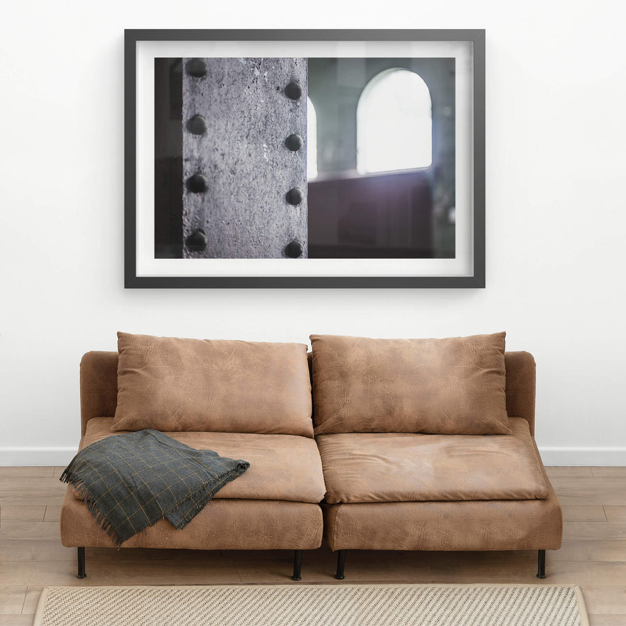 Rivets at West Ryde Pumping Station, black-framed print displayed in situ on a wall.