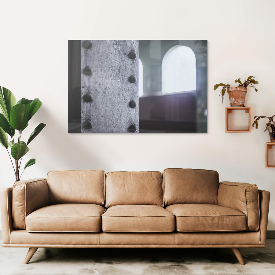 Rivets at West Ryde Pumping Station, glass print displayed in situ on a wall.