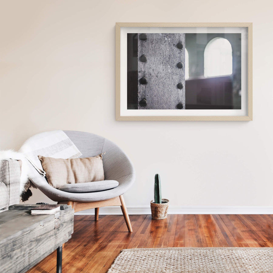 Rivets at West Ryde Pumping Station, raw timber-framed print displayed in situ on a wall.