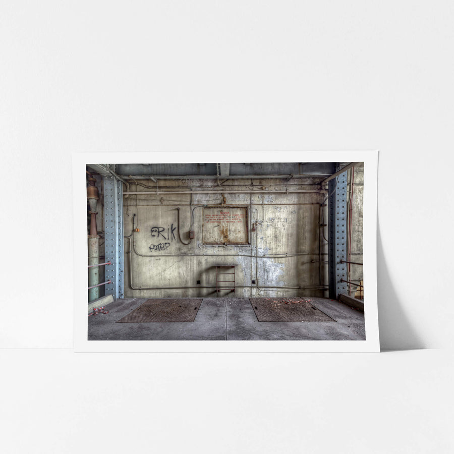 Alternator Air Chamber at White Bay Power Station, a sealed hatch looms above the air chamber, once a critical access point.