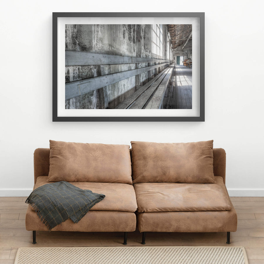 Entertainment Hall Seating at White Bay Power Station, the long wooden bench stretches the length of the hall,.