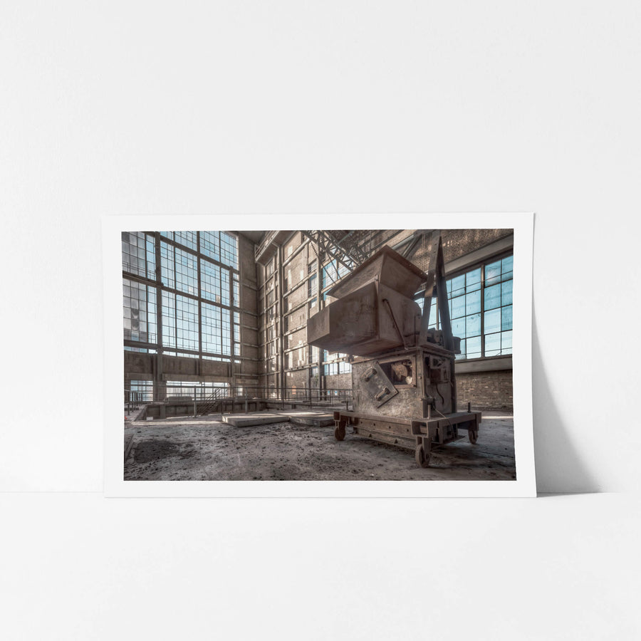 Mystery Machine at White Bay Power Station, a heavy steel skip sits on iron wheels in the centre of the turbine hall floor.