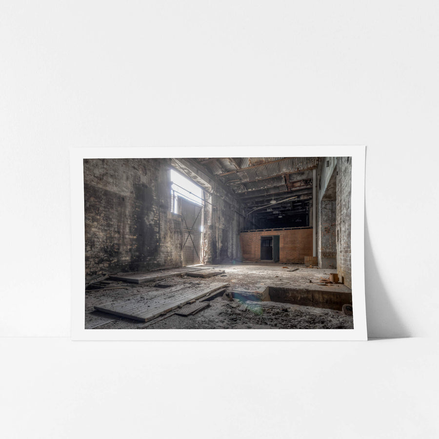 Rail Corridor Exit at White Bay Power Station, light enters through a high industrial opening on the left wall, falling.