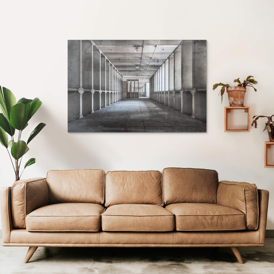 Reactor Room at White Bay Power Station, reinforced concrete bays line both sides of a long corridor deep inside White Bay.