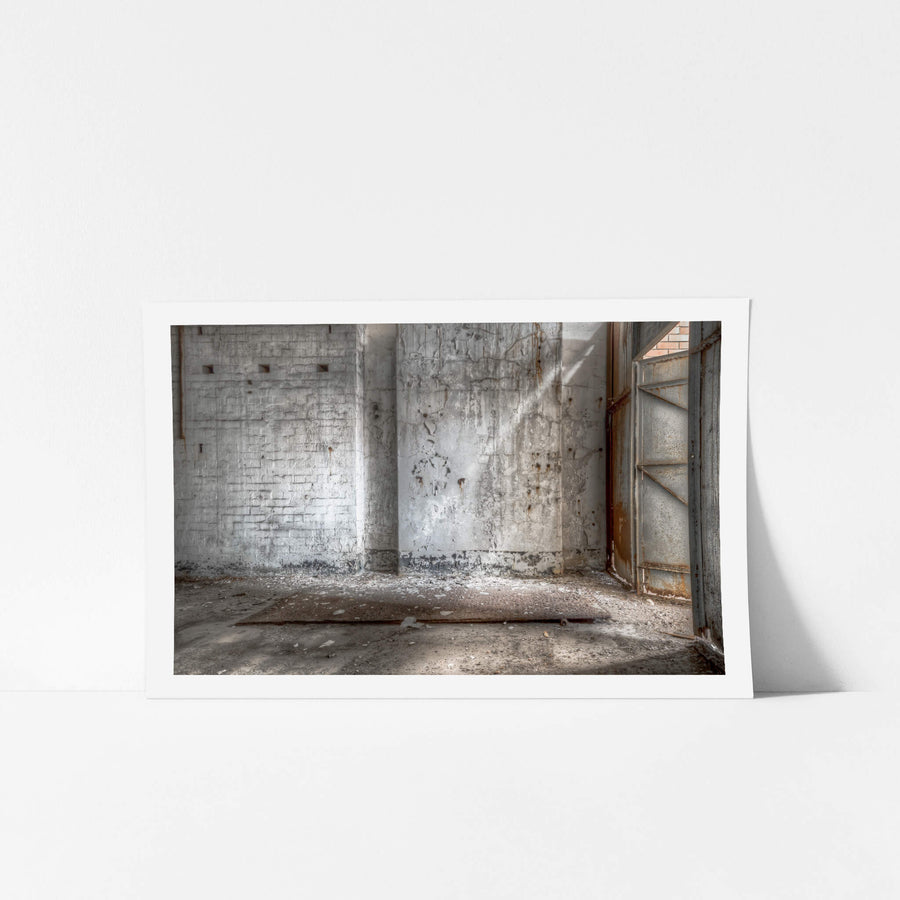 Turbine Hall Storage Room at White Bay Power Station, light filters through the rusted steel door of White Bay Power Station.